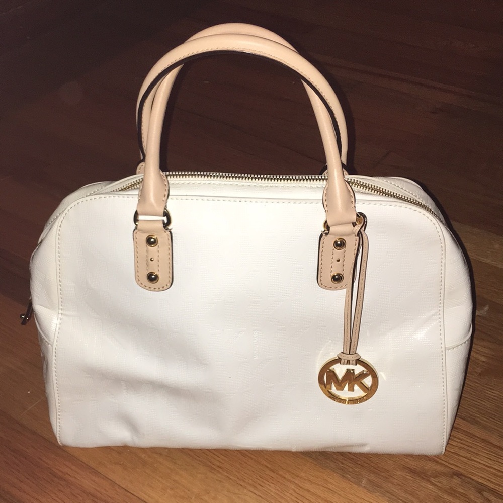 White Michael Kors purse- gently used